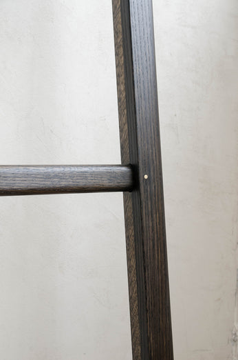 Close up of Oxidized Oak ladder with metal detail