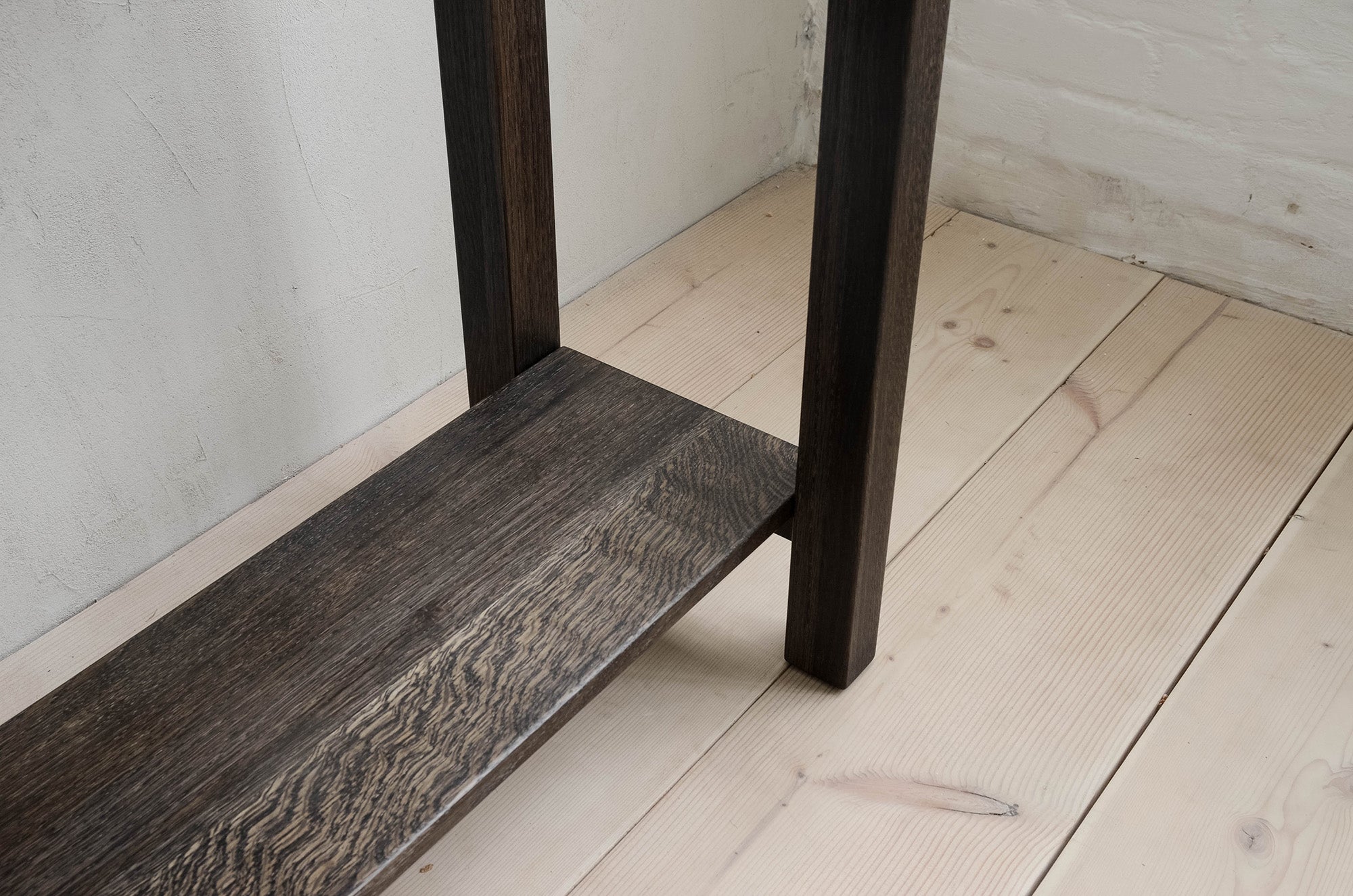 Closeup of Lore ConSole Base in Oxidized Oak