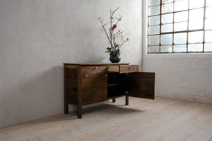 Lore Sideboard From The Side With and Open Drawer and Door