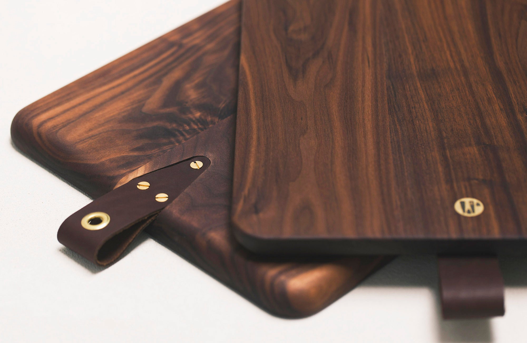 Stacked Cooper Bread Boards Black Walnut With Leather and Brass Details