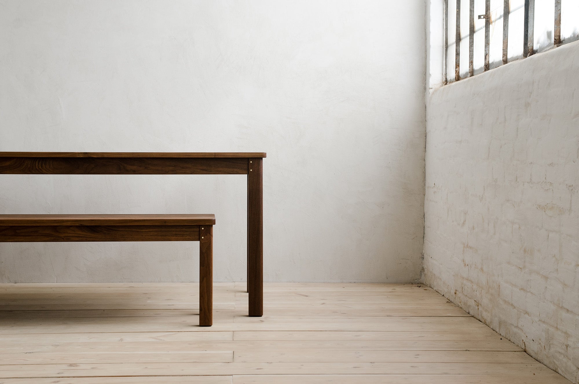 Stacked Lore Dining Table Over Lore Bench With Brass Details