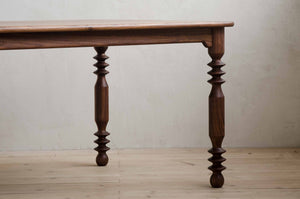 Closeup of Flora Dining Table Showing Details on Legs