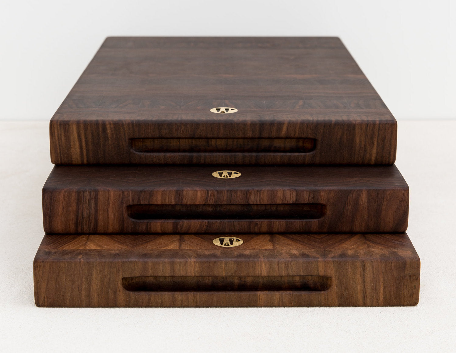 Three Stacked Wesley Butcher Blocks in Black Walnut With Brass Logos