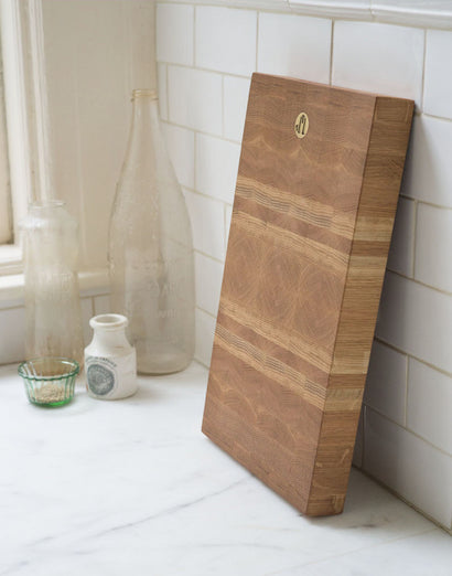 Press Image of cutting board leaning against kitchen wall