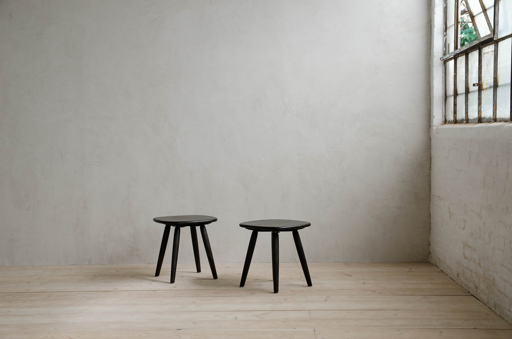 Two Small Nomad Side Tables in Empty Modern Room