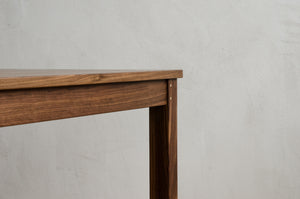 Closeup Corner of Lore Dining Table With Brass Details