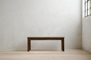 Lore Bench in Natural Walnut in an Empty Modern Room